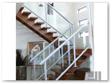 Open-rise-saw-tooth-stairs-with-powdercoated-aluminium-handrails-and-glass-balustrades